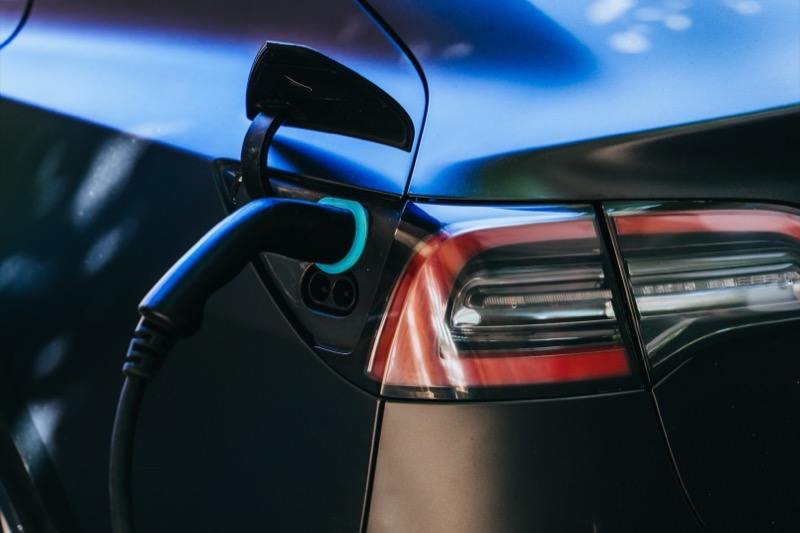 Futuristic EV charging technology concept representing common myths about electric vehicle charging