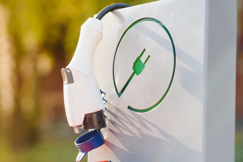 Electric vehicle at a charging station with a high-power Level 2 charger
